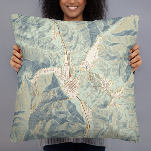 Person holding 22x22 Custom Sun Valley Idaho Map Throw Pillow in Woodblock