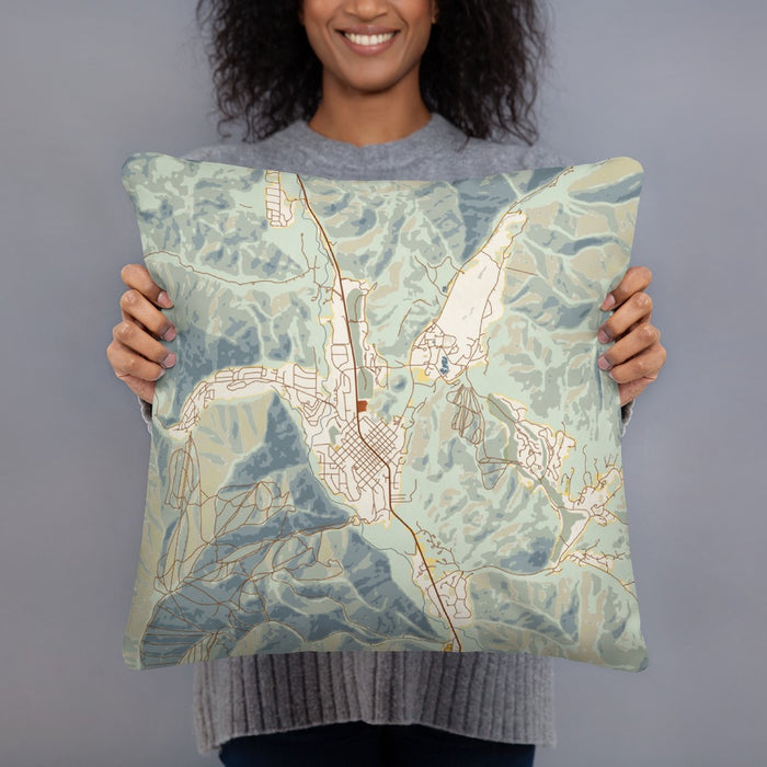 Person holding 18x18 Custom Sun Valley Idaho Map Throw Pillow in Woodblock