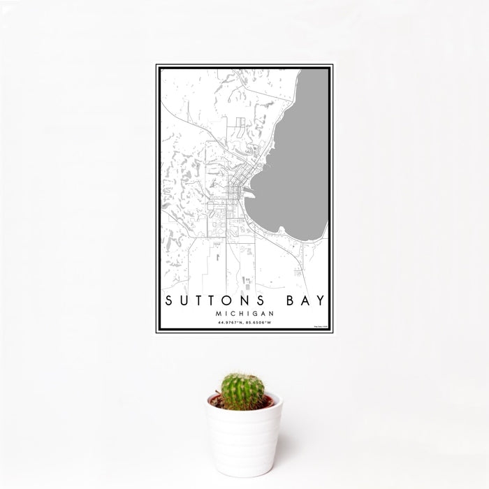 12x18 Suttons Bay Michigan Map Print Portrait Orientation in Classic Style With Small Cactus Plant in White Planter