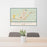 24x36 Sweetwater Texas Map Print Lanscape Orientation in Woodblock Style Behind 2 Chairs Table and Potted Plant