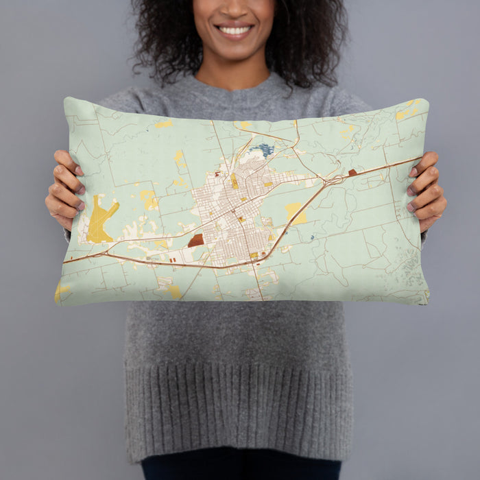 Person holding 20x12 Custom Sweetwater Texas Map Throw Pillow in Woodblock