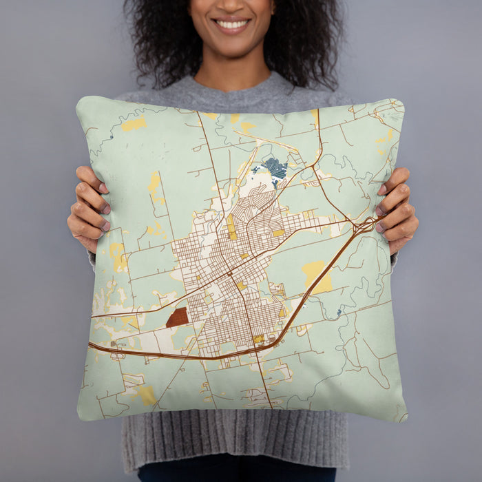 Person holding 18x18 Custom Sweetwater Texas Map Throw Pillow in Woodblock