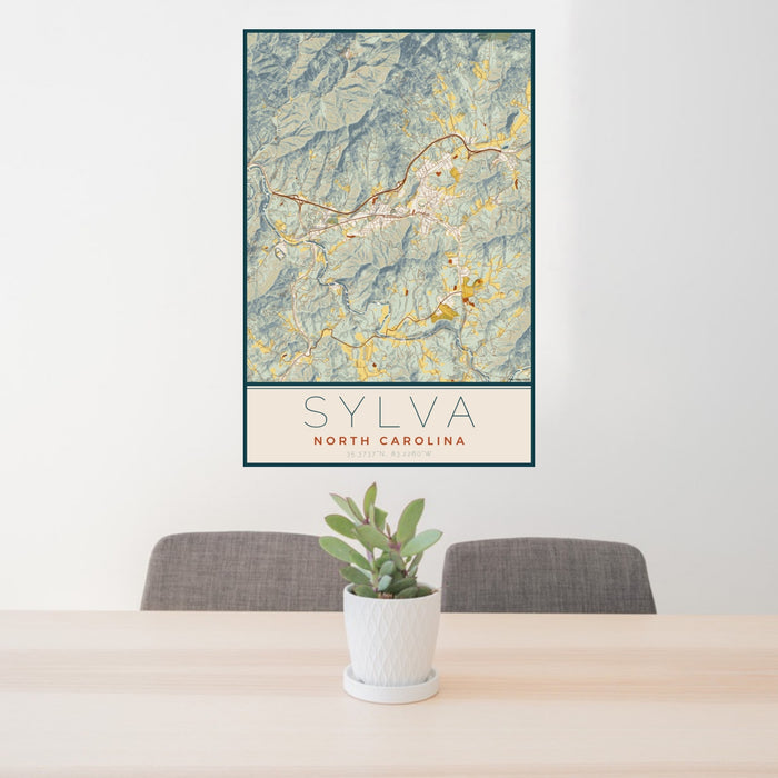24x36 Sylva North Carolina Map Print Portrait Orientation in Woodblock Style Behind 2 Chairs Table and Potted Plant