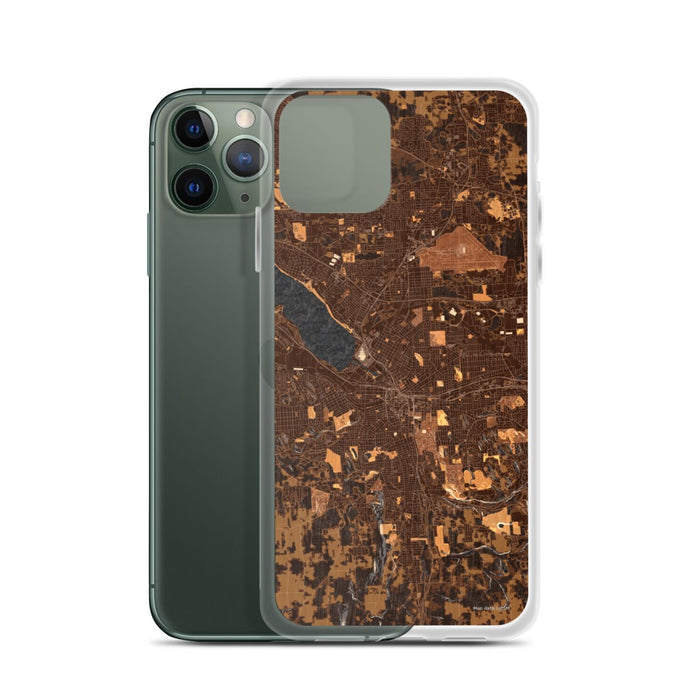 Custom Syracuse New York Map Phone Case in Ember on Table with Laptop and Plant