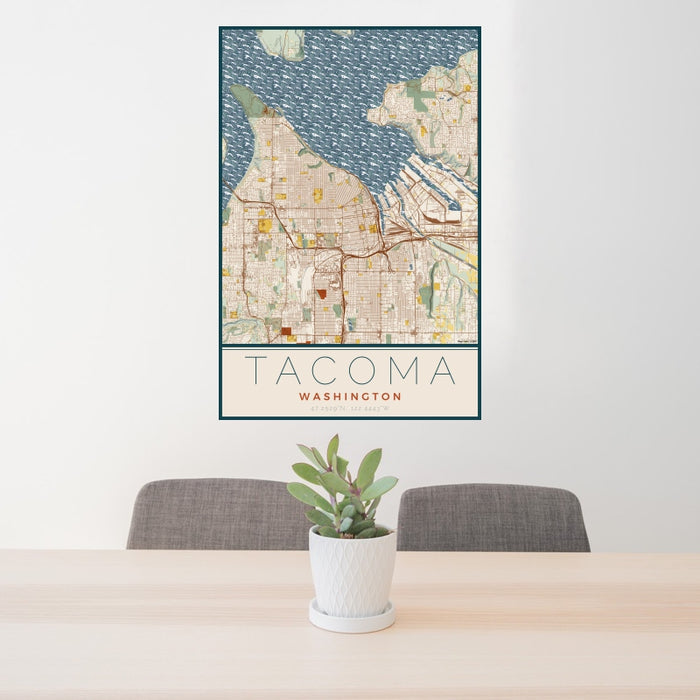 24x36 Tacoma Washington Map Print Portrait Orientation in Woodblock Style Behind 2 Chairs Table and Potted Plant