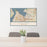 24x36 Tacoma Washington Map Print Landscape Orientation in Woodblock Style Behind 2 Chairs Table and Potted Plant