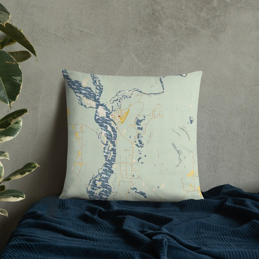 Custom Talkeetna Alaska Map Throw Pillow in Woodblock on Bedding Against Wall
