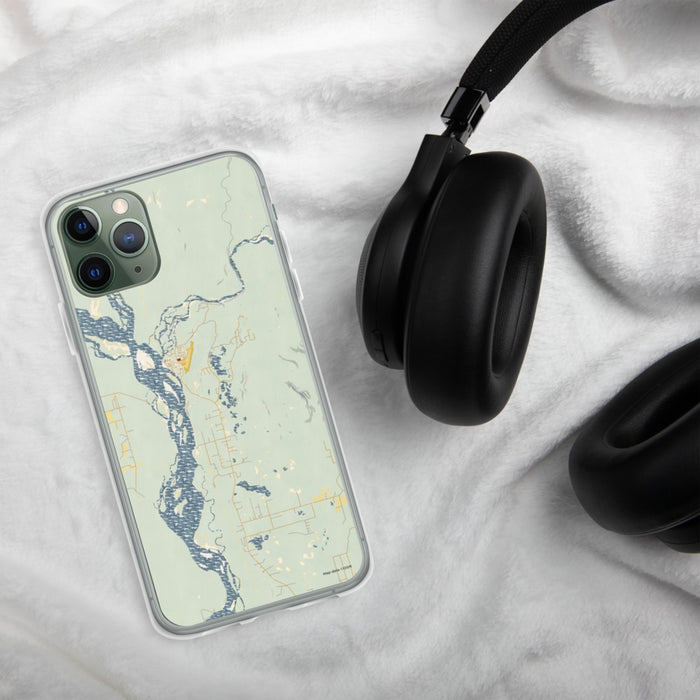 Custom Talkeetna Alaska Map Phone Case in Woodblock on Table with Black Headphones