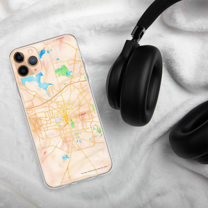 Custom Tallahassee Florida Map Phone Case in Watercolor on Table with Black Headphones
