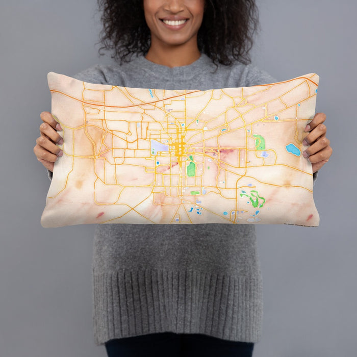 Person holding 20x12 Custom Tallahassee Florida Map Throw Pillow in Watercolor