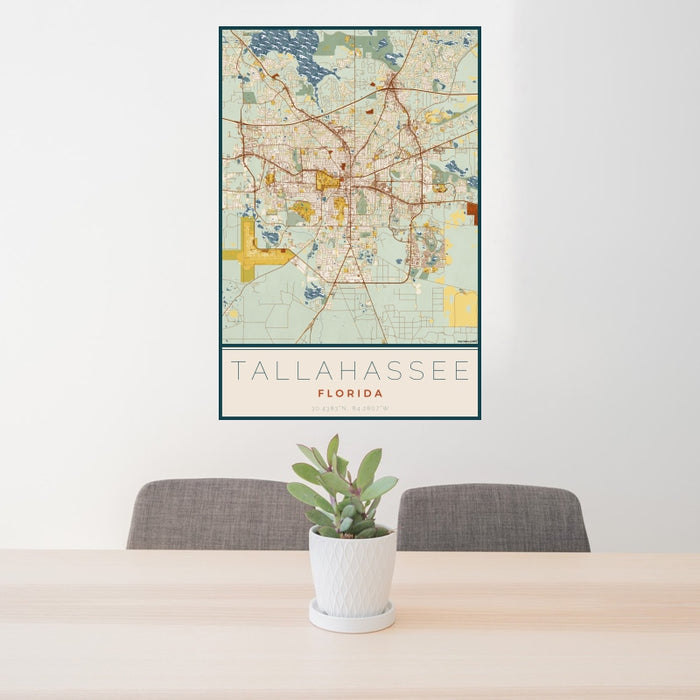 24x36 Tallahassee Florida Map Print Portrait Orientation in Woodblock Style Behind 2 Chairs Table and Potted Plant