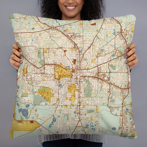 Person holding 22x22 Custom Tallahassee Florida Map Throw Pillow in Woodblock