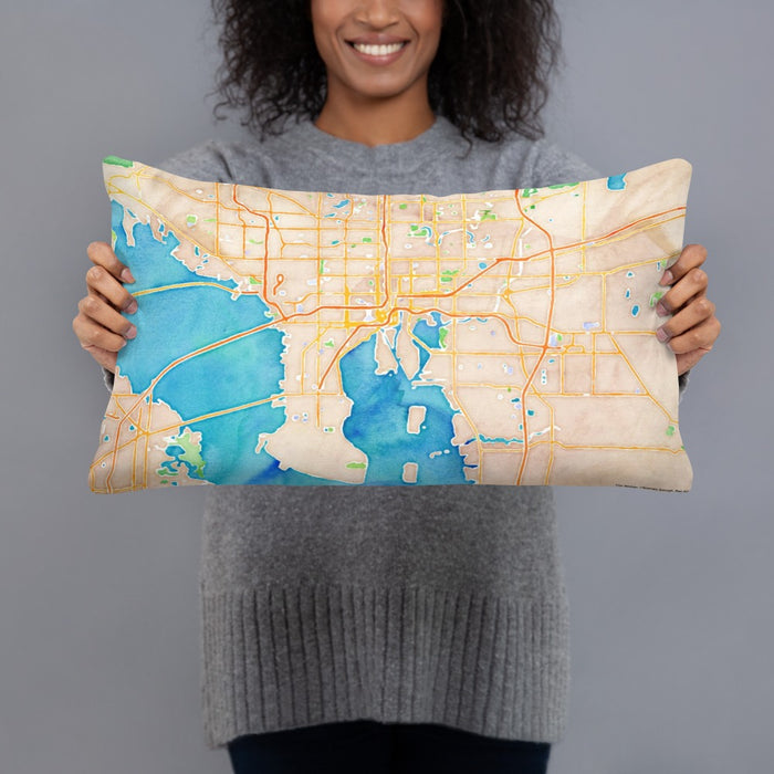 Person holding 20x12 Custom Tampa Florida Map Throw Pillow in Watercolor