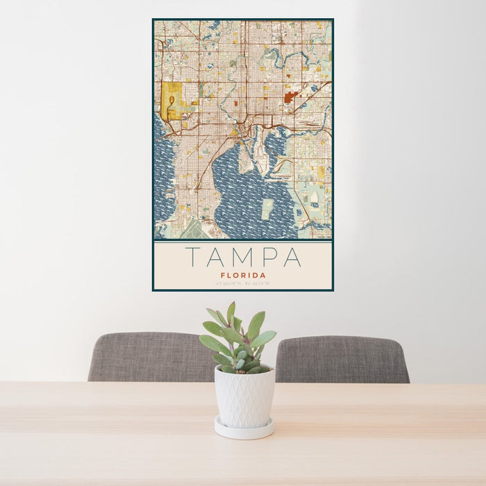 24x36 Tampa Florida Map Print Portrait Orientation in Woodblock Style Behind 2 Chairs Table and Potted Plant
