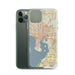 Custom Tampa Florida Map Phone Case in Woodblock on Table with Laptop and Plant