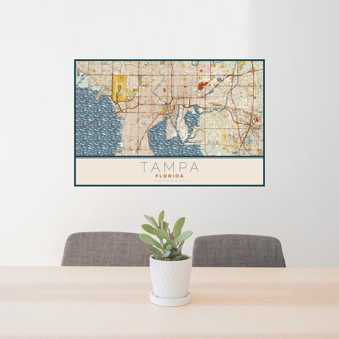 24x36 Tampa Florida Map Print Landscape Orientation in Woodblock Style Behind 2 Chairs Table and Potted Plant