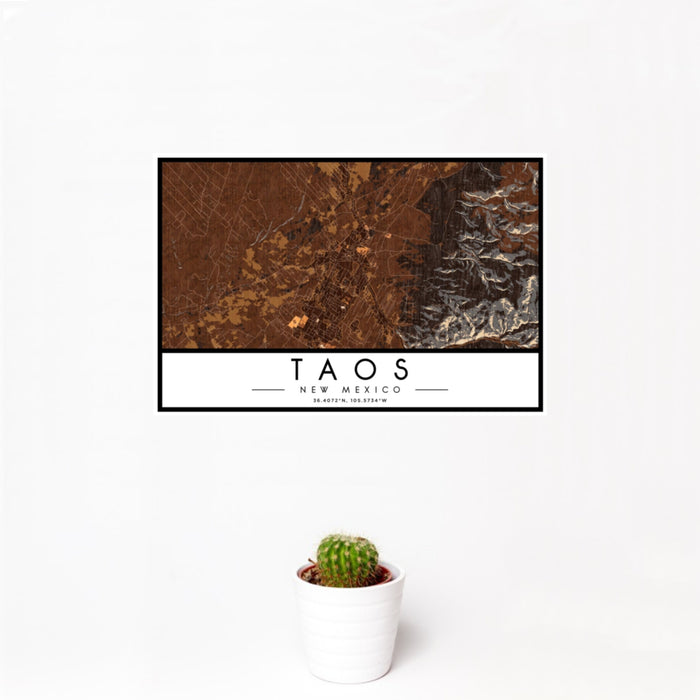 12x18 Taos New Mexico Map Print Landscape Orientation in Ember Style With Small Cactus Plant in White Planter