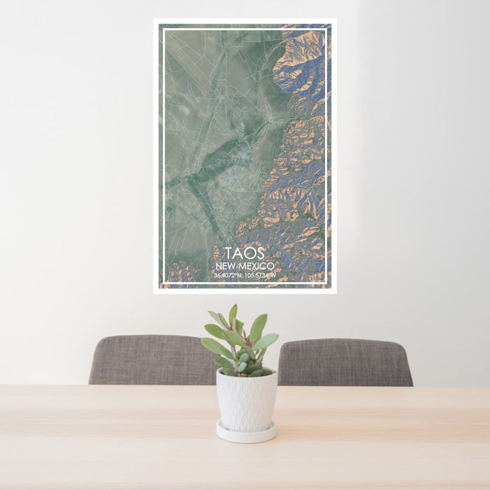 24x36 Taos New Mexico Map Print Portrait Orientation in Afternoon Style Behind 2 Chairs Table and Potted Plant