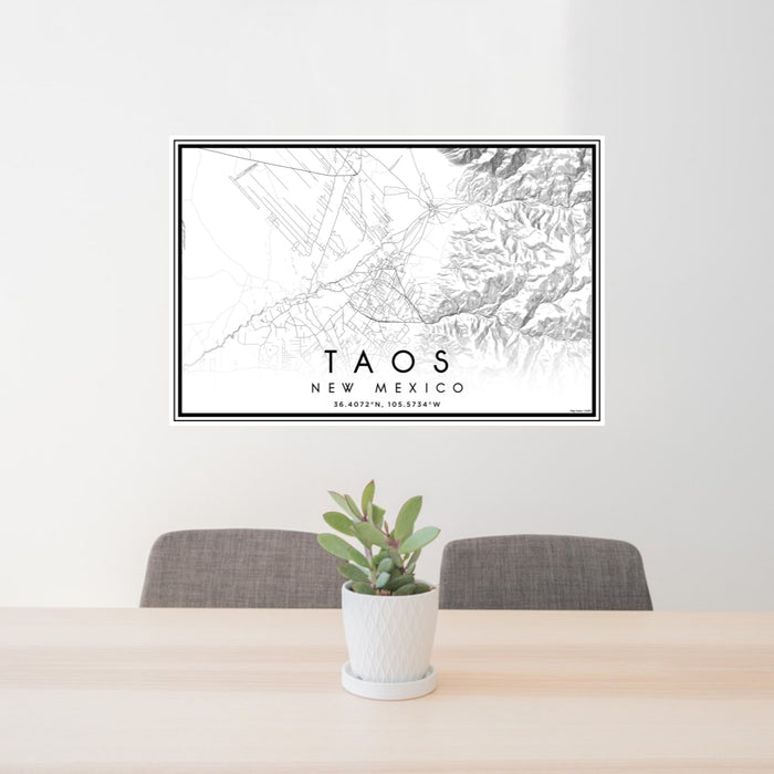 24x36 Taos New Mexico Map Print Lanscape Orientation in Classic Style Behind 2 Chairs Table and Potted Plant