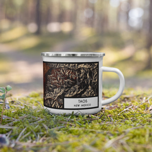 Right View Custom Taos New Mexico Map Enamel Mug in Ember on Grass With Trees in Background