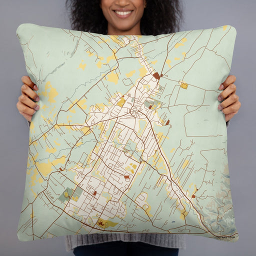 Person holding 22x22 Custom Taos New Mexico Map Throw Pillow in Woodblock