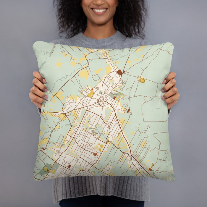 Person holding 18x18 Custom Taos New Mexico Map Throw Pillow in Woodblock