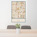 24x36 Taylorsville Utah Map Print Portrait Orientation in Woodblock Style Behind 2 Chairs Table and Potted Plant