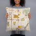 Person holding 18x18 Custom Taylorsville Utah Map Throw Pillow in Woodblock