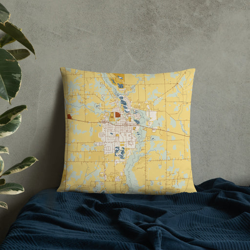 Custom Tecumseh Michigan Map Throw Pillow in Woodblock on Bedding Against Wall