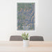 24x36 Telluride Colorado Map Print Portrait Orientation in Afternoon Style Behind 2 Chairs Table and Potted Plant