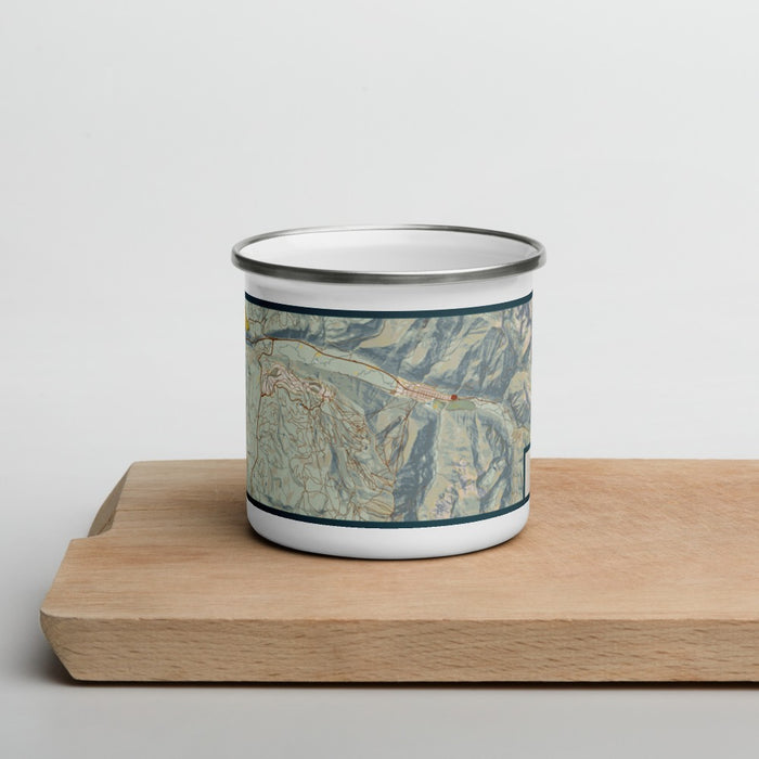 Front View Custom Telluride Colorado Map Enamel Mug in Woodblock on Cutting Board