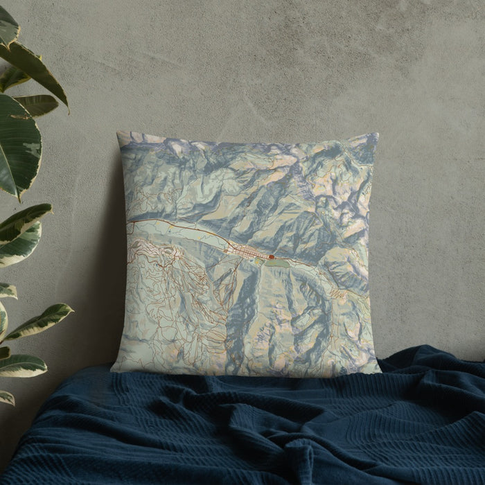 Custom Telluride Colorado Map Throw Pillow in Woodblock on Bedding Against Wall