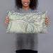 Person holding 20x12 Custom Telluride Colorado Map Throw Pillow in Woodblock