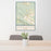 24x36 Terlingua Texas Map Print Portrait Orientation in Woodblock Style Behind 2 Chairs Table and Potted Plant