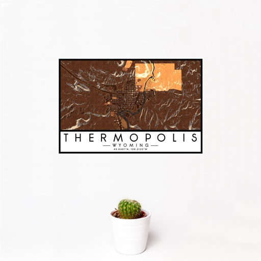 12x18 Thermopolis Wyoming Map Print Landscape Orientation in Ember Style With Small Cactus Plant in White Planter