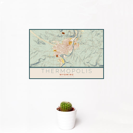 12x18 Thermopolis Wyoming Map Print Landscape Orientation in Woodblock Style With Small Cactus Plant in White Planter