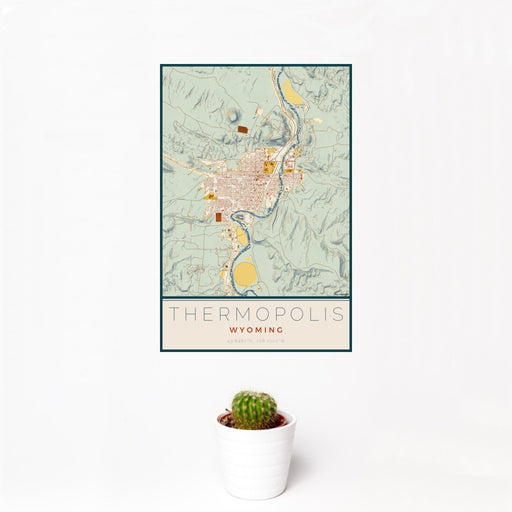 12x18 Thermopolis Wyoming Map Print Portrait Orientation in Woodblock Style With Small Cactus Plant in White Planter
