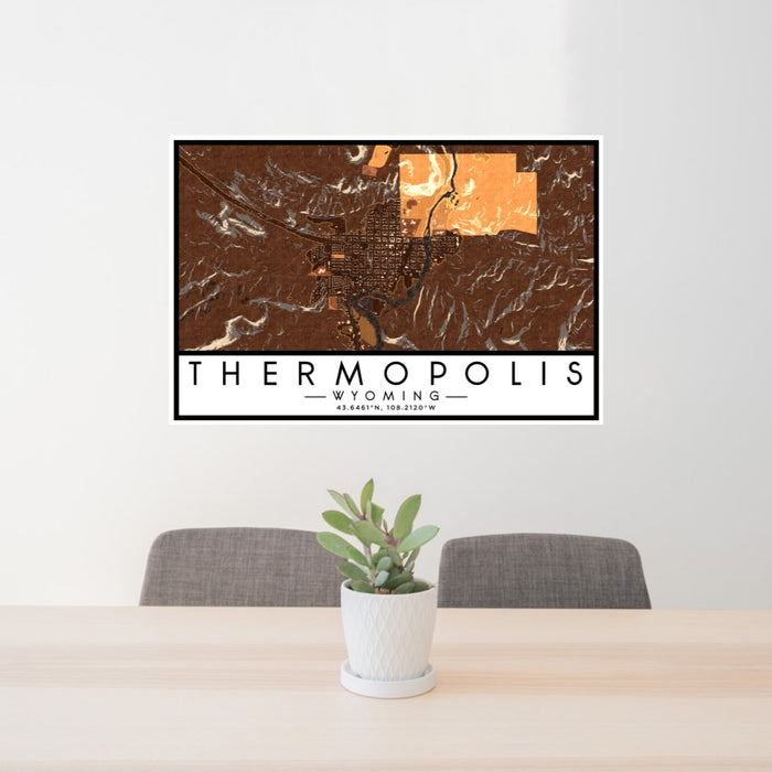 24x36 Thermopolis Wyoming Map Print Lanscape Orientation in Ember Style Behind 2 Chairs Table and Potted Plant