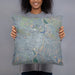 Person holding 18x18 Custom Thermopolis Wyoming Map Throw Pillow in Afternoon