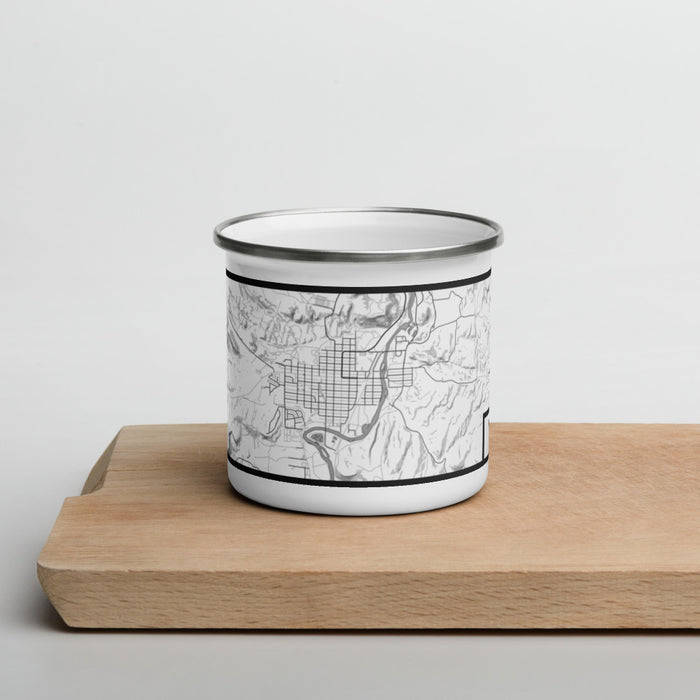 Front View Custom Thermopolis Wyoming Map Enamel Mug in Classic on Cutting Board