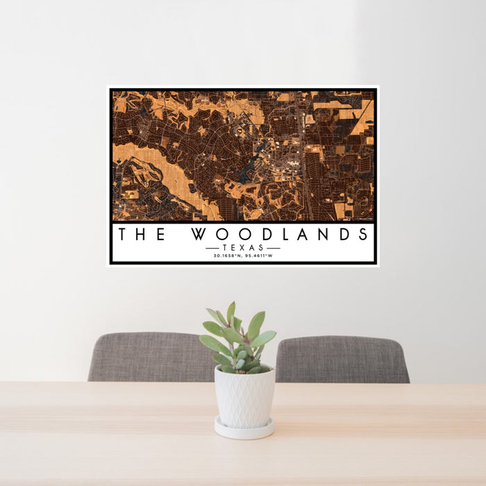 24x36 The Woodlands Texas Map Print Lanscape Orientation in Ember Style Behind 2 Chairs Table and Potted Plant