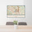 24x36 The Woodlands Texas Map Print Lanscape Orientation in Woodblock Style Behind 2 Chairs Table and Potted Plant