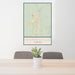 24x36 Thomasville Alabama Map Print Portrait Orientation in Woodblock Style Behind 2 Chairs Table and Potted Plant