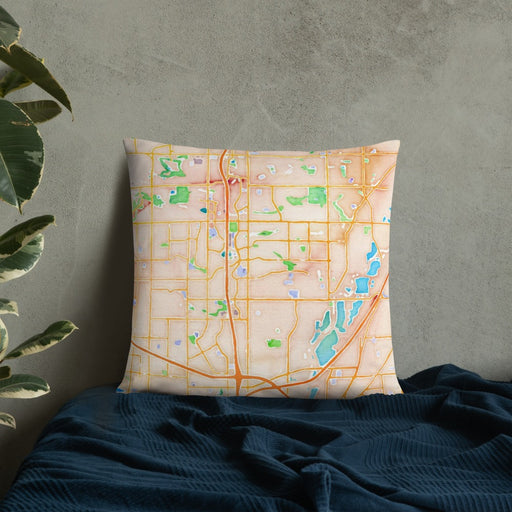 Custom Thornton Colorado Map Throw Pillow in Watercolor on Bedding Against Wall