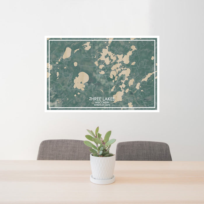 24x36 Three Lakes Wisconsin Map Print Lanscape Orientation in Afternoon Style Behind 2 Chairs Table and Potted Plant