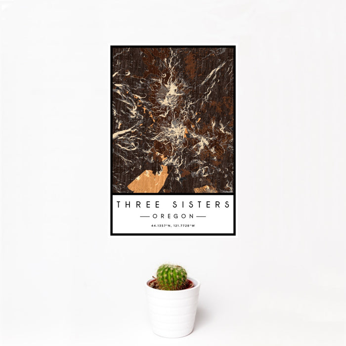 12x18 Three Sisters Oregon Map Print Portrait Orientation in Ember Style With Small Cactus Plant in White Planter