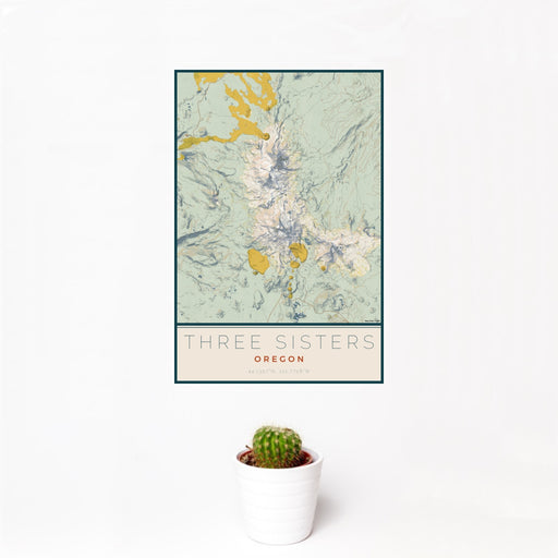 12x18 Three Sisters Oregon Map Print Portrait Orientation in Woodblock Style With Small Cactus Plant in White Planter