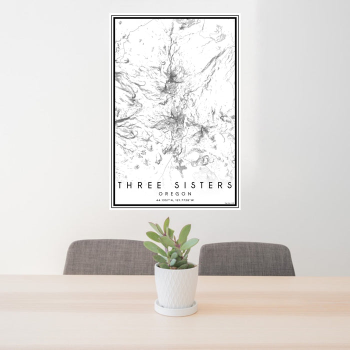 24x36 Three Sisters Oregon Map Print Portrait Orientation in Classic Style Behind 2 Chairs Table and Potted Plant