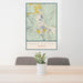 24x36 Three Sisters Oregon Map Print Portrait Orientation in Woodblock Style Behind 2 Chairs Table and Potted Plant