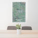 24x36 Tillamook Oregon Map Print Portrait Orientation in Afternoon Style Behind 2 Chairs Table and Potted Plant